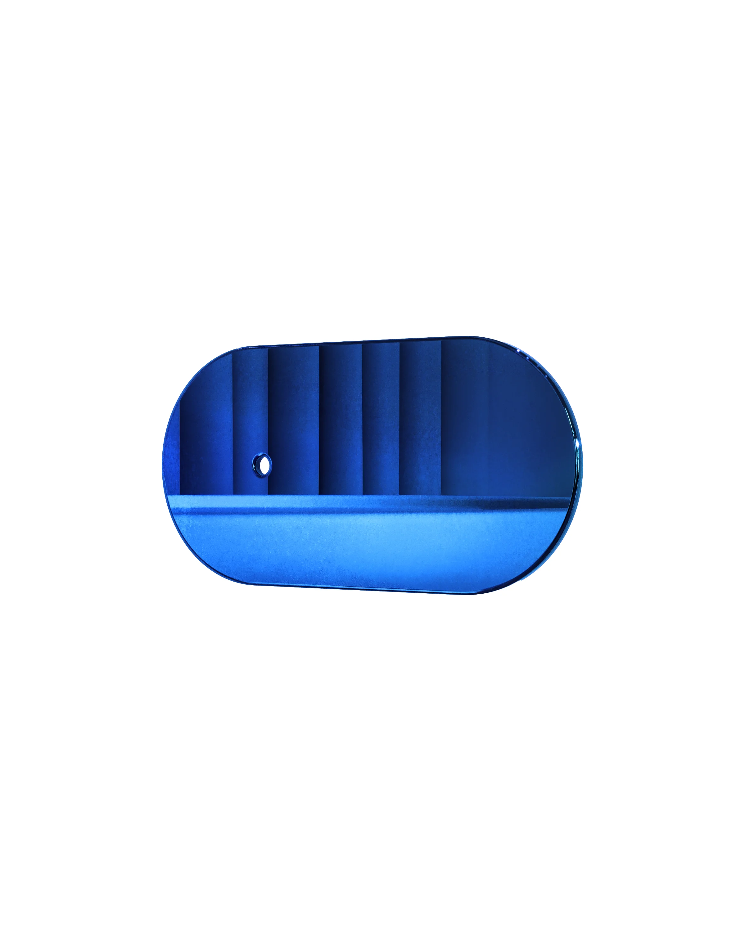 Oval, blue pad with rounded sides, with a small, round hole on the left. The pad is placed on a white background. 
